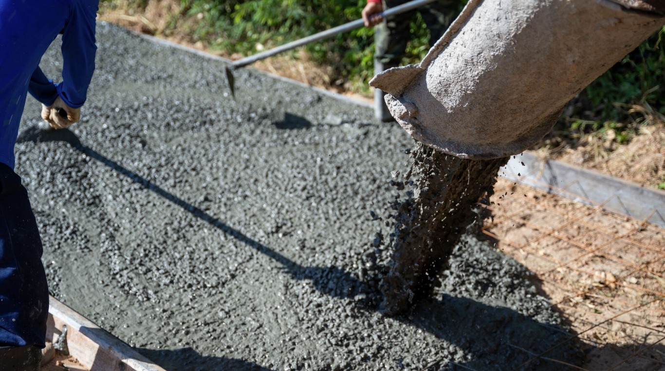 Commercial concrete services with fresh concrete being poured for business projects in Land O Lakes